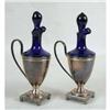 Image 1 : A PAIR OF COBALT GLASS AND SILVER ON COPPER DIMINUTIVE DECANTERS