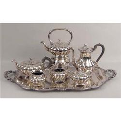 A SIX PIECE SILVER-PLATED COFFEE AND TEA SERVICE WITH TRAY