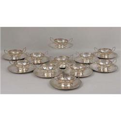 A SET OF TWELVE GORHAM STERLING SILVER BOUILLON HOLDERS
