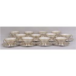 A SET OF TWELVE TIFFANY & CO. MAKERS STERLING SILVER BOUILLON HOLDERS