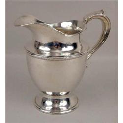 AN INTERNATIONAL SILVER STERLING WATER PITCHER