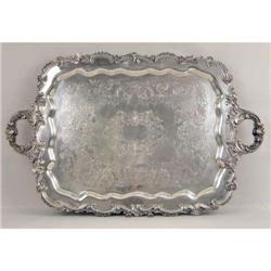 A SILVER ON COPPER DOUBLE HANDLED FOOTED RECTANGULAR TEA TRAY