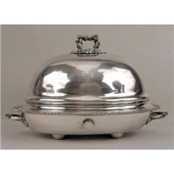 A SILVER PLATED DOUBLE HANDLED WARMING WELL-AND-TREE PLATTER WITH A DOMED COVER