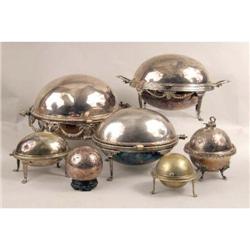 THREE SILVER PLATED OVAL REVOLVING LIDDED BREAKFAST SERVERS