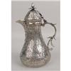 Image 1 : A MIDDLE EASTERN SILVERED METAL COFFEE POT
