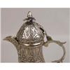 Image 2 : A MIDDLE EASTERN SILVERED METAL COFFEE POT