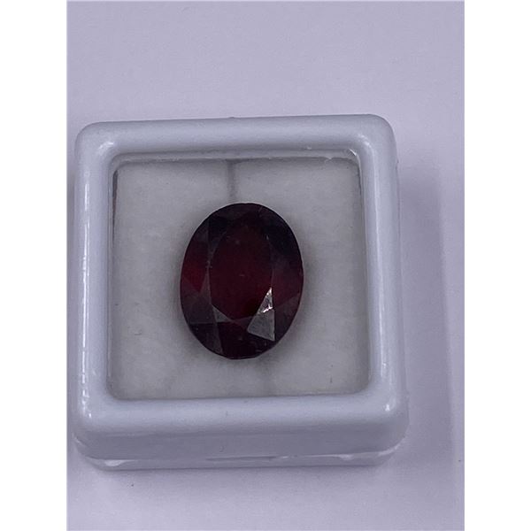 EXCEPTIONAL GARNET, 10.58CT, 14.89 X 11.23 X 7.17MM, OVAL CUT, SI2 CLARITY, BRAZIL, UNTREATED