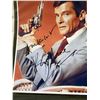 Image 2 : ROGER MOORE SIGNED 007 PHOTO WITH COA