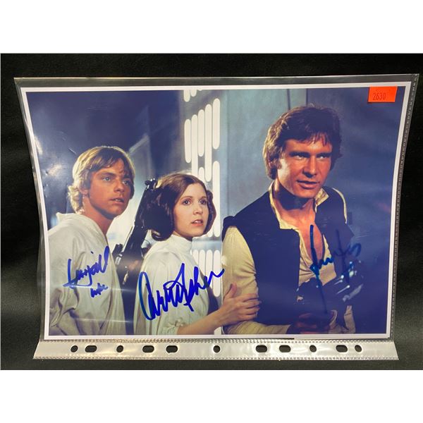 STAR WARS SIGNED PHOTO (3 SIGNATURES) HARRISON FORD, CARRIE FISHER, MARK HAMILL