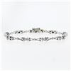 Image 1 : 14K White Gold 7" .33 ctw Bezel Set Diamond & Figure "X" Link Tennis Bracelet