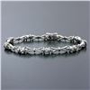 Image 2 : 14K White Gold 7" .33 ctw Bezel Set Diamond & Figure "X" Link Tennis Bracelet