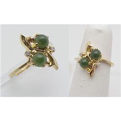 Lady's emerald and diamond ring