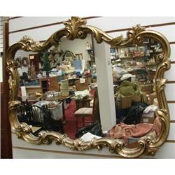 Fancy gold framed mirror