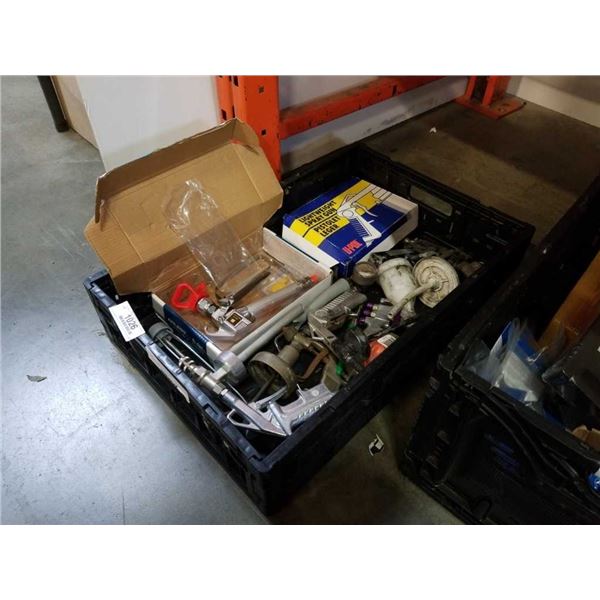 Crate of spray guns and parts