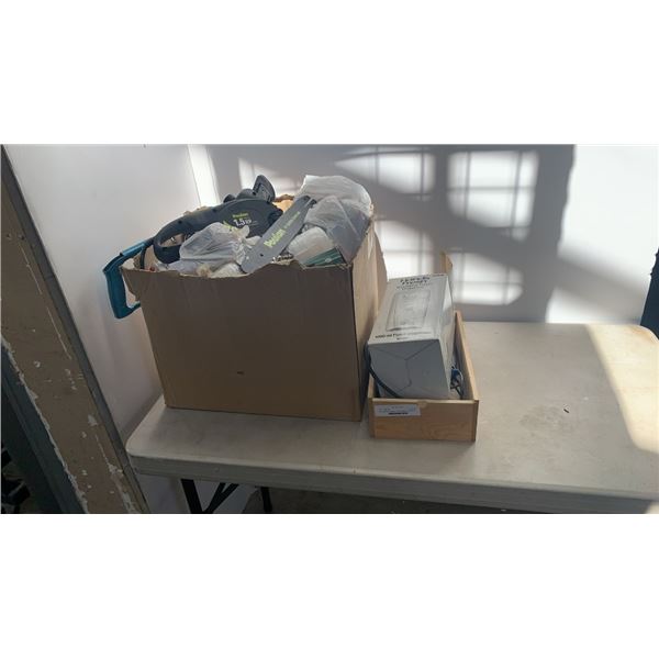Box of poulan chainsaw, POS handheld, touchless dispenser and more