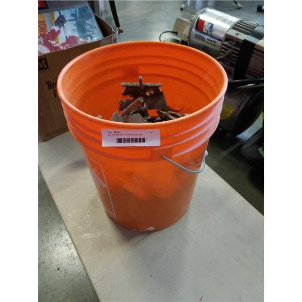 Bucket of aquarium rock and accessories