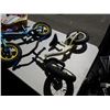 Image 2 : Two kids Strider bikes, tricycle and lawn mower toy