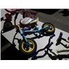 Image 3 : Two kids Strider bikes, tricycle and lawn mower toy