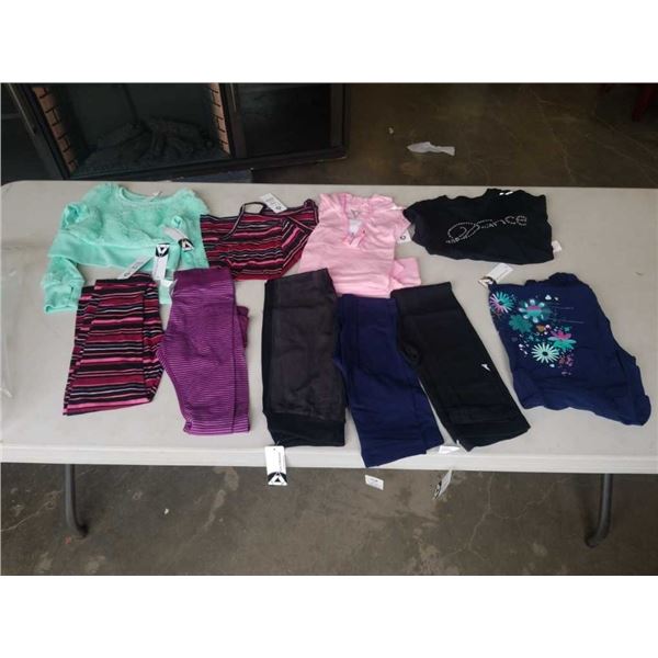 Lot of brand new S-L (4-9yrs) clothing