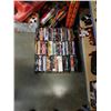 Image 1 : Large trays of DVDs and DVD sets