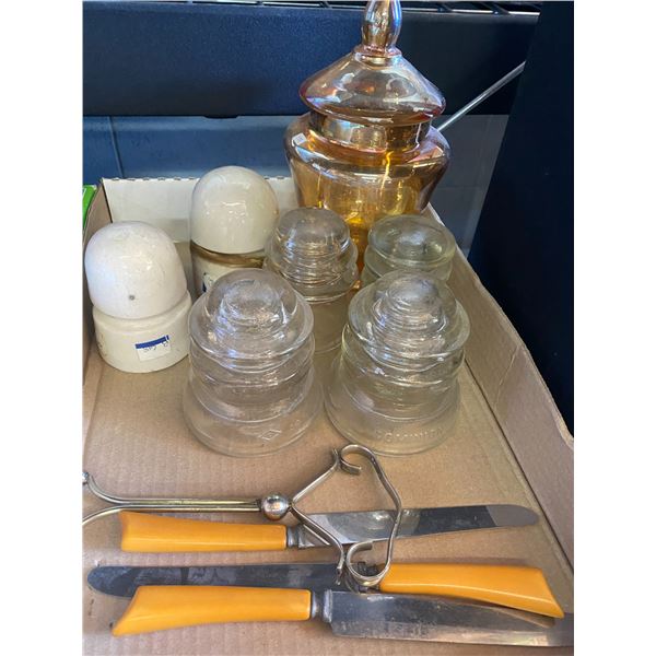 Insulators, lidded jar and 3 knives