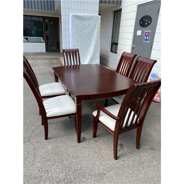 Table 6 chairs and a leaf