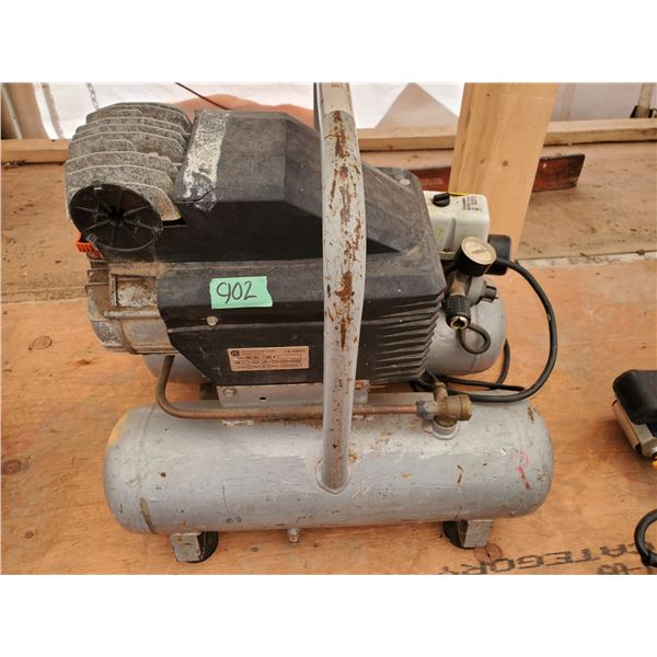 Small grey air compressor