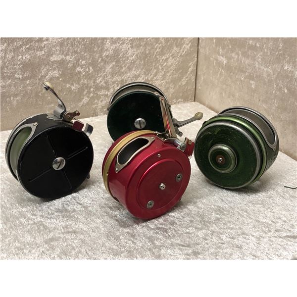 Group of 4 assorted vintage automatic fly reels