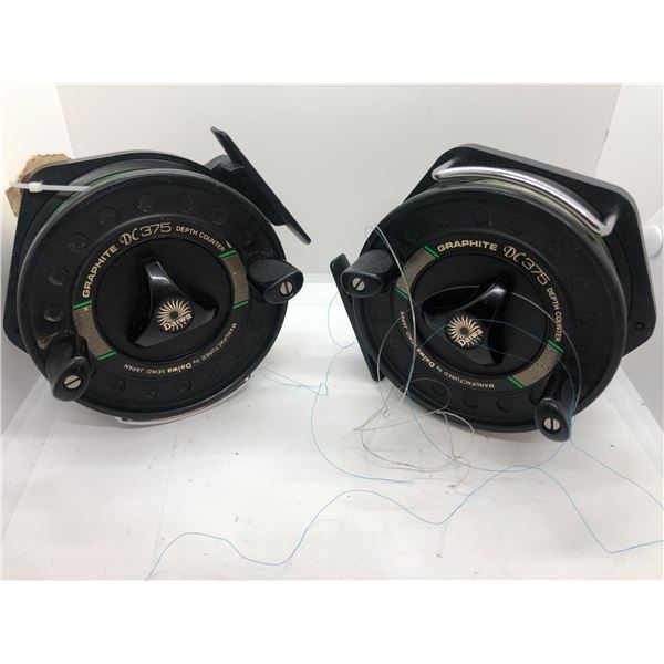 Two Daiwa DC375 salmon mooching reels w/ depth counters