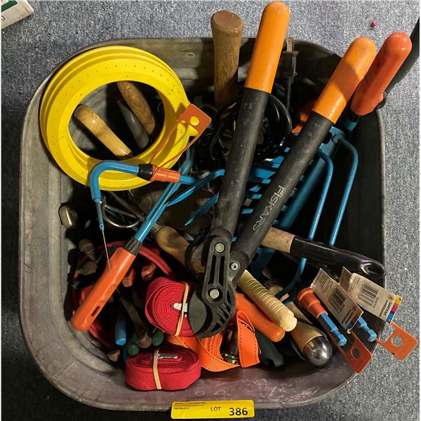 Galvanized tub full of assorted small garden tools