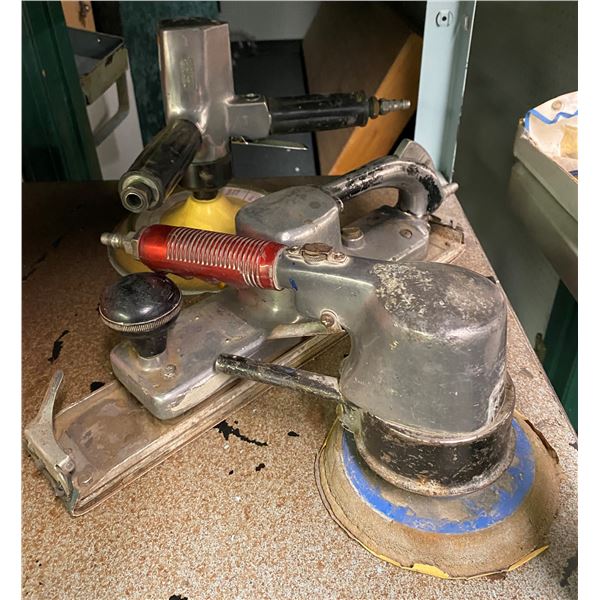 Group of three pneumatic body shop sanders