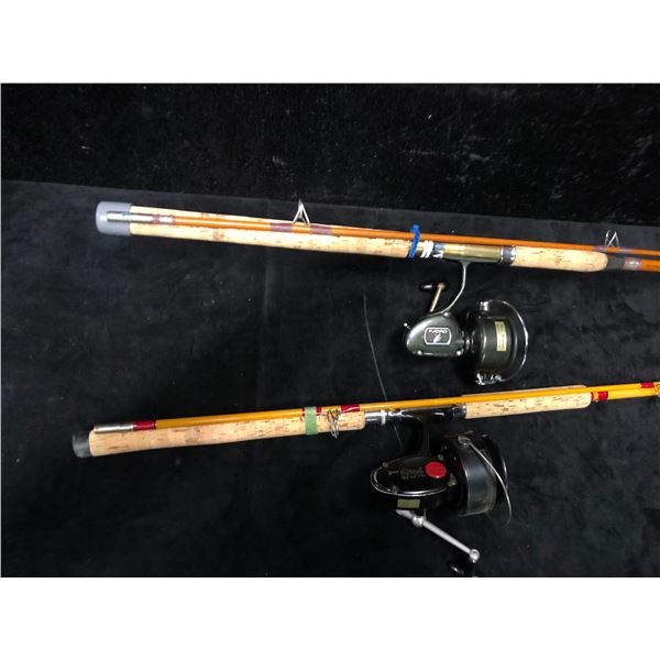 Two heavy duty spinning rods w/ reels