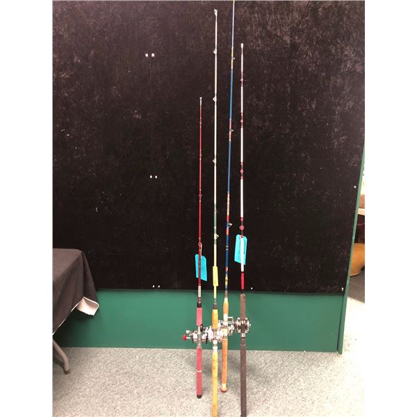 Group of 4 assorted halibut/trolling rods complete with level wind reels