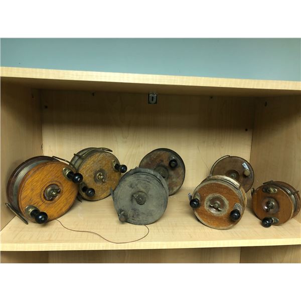 Group of 7 vintage wooden trolling reels (well used, some missing parts)