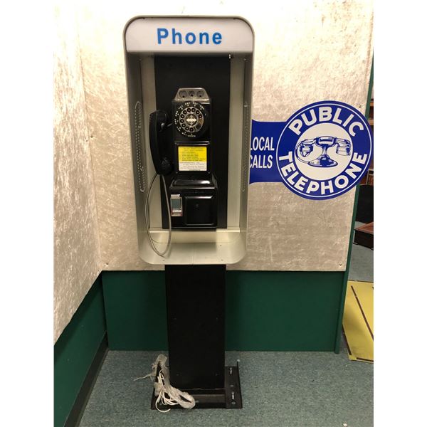 Vintage telephone booth w/ coin-operated phone & Public Telephone sign