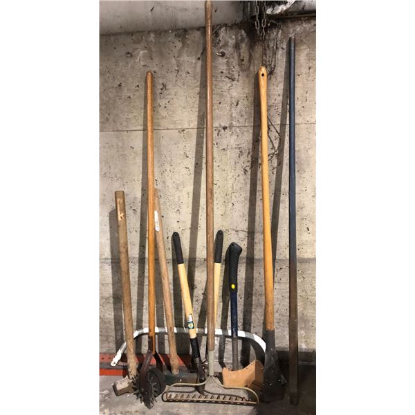 Group of 9 assorted yard tools - axe/ sledge hammer/ rake/ pruners etc.