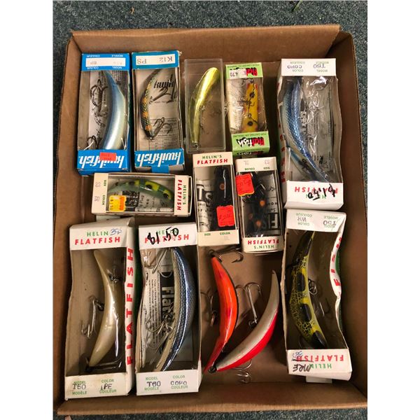 Group of 13 large sized vintage flat fish fishing lures (most in original packaging)