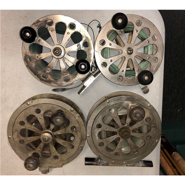 Group of 4 early 1900's center-pin salmon reels