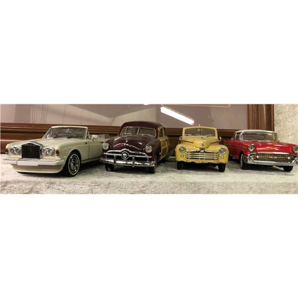 Group of 4 die cast metal classic collector's cars