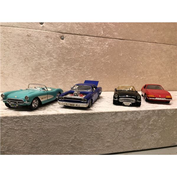 Group of 4 die cast metal classic muscle collector's cars