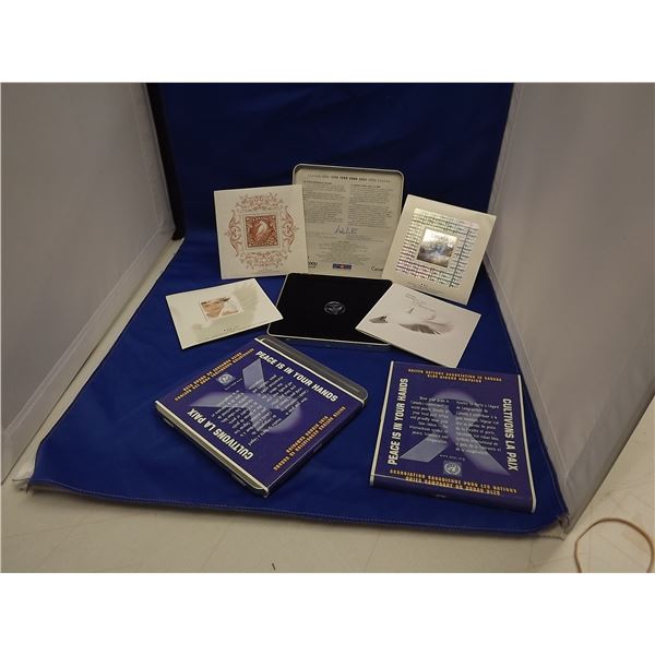 LOT OF 2 1999/2000 CNDN COMMEMORATIVE STAMP PACK - 3 STAMPS & 1 COIN