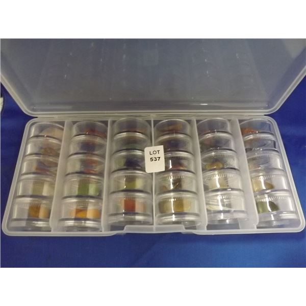 CASE FULL OF POLISHED ROCKS IN DISPLAY CASES