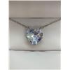 Image 2 : Heart Shaped Necklace with a Subtle Bule Gemstone.