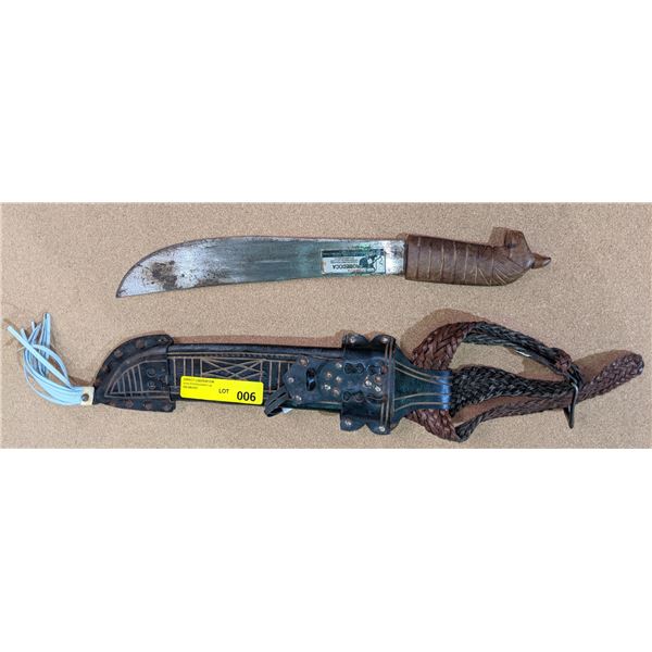 Fancy wood carved handled machete w/leather sheath from the show