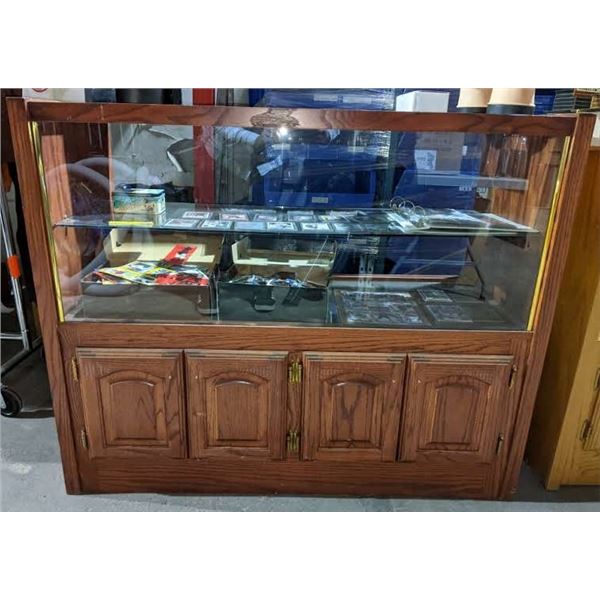 Wooden glass showcase dimensions 4ft across by 1 ft 8 inches wide stands 3ft 3 inches high (no back 