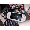 Image 3 : Large shelf lot with assorted gamers and collectible items - nintendo wii, sony PSP, games, consoles
