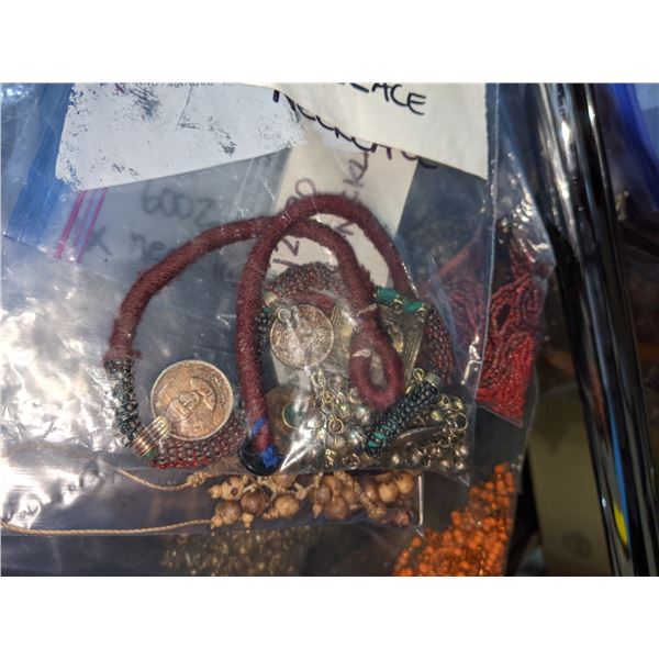 Large lot of approx. 10 hangers filled with assorted costume jewelry and accessories from the sci-fi