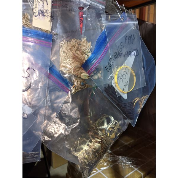 Large lot of approx. 10 hangers filled with assorted costume jewelry and accessories from the sci-fi