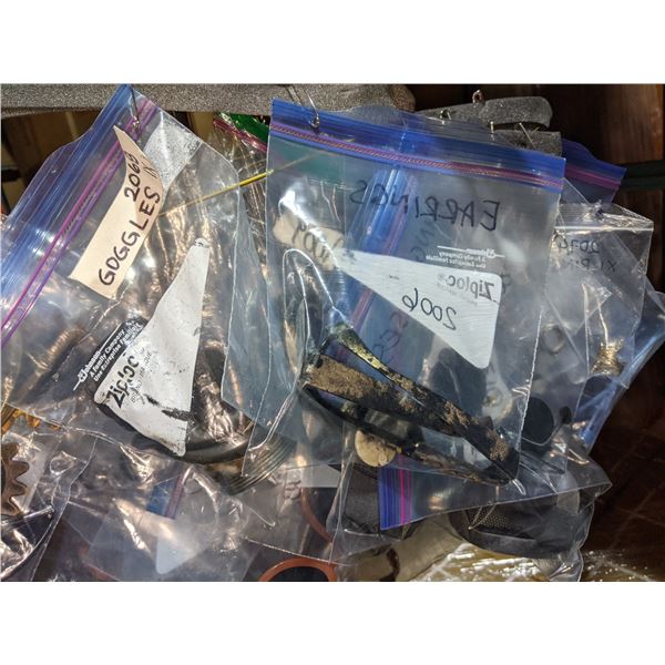 Large lot of approx. 10 hangers filled with assorted costume jewelry and accessories from the sci-fi