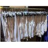 Image 1 : A rack of white muscle shirts from Project Blue Book